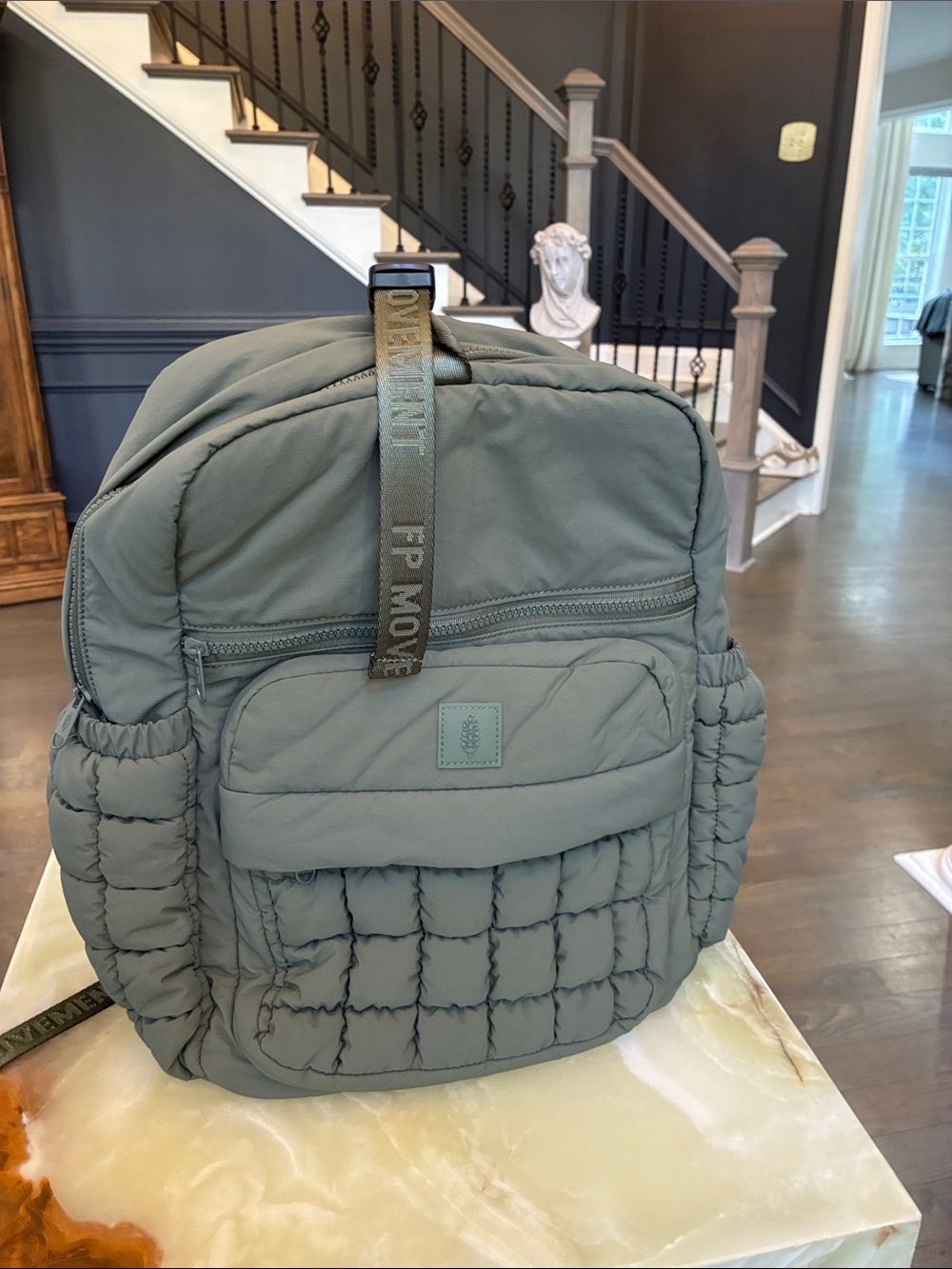 Free People Quilted Puffer Backpack in Sage